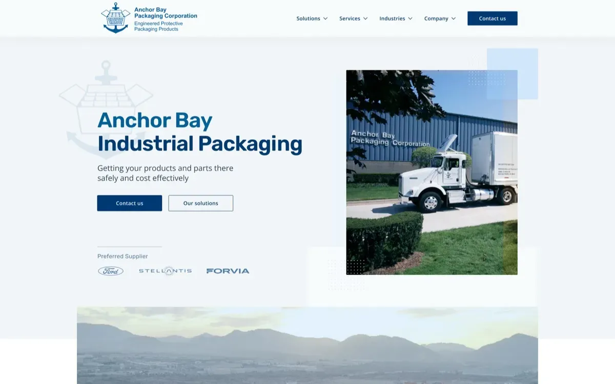 The Anchor Bay Packaging Corporation website, built by Ditrapoint, shown on a laptop and a phone