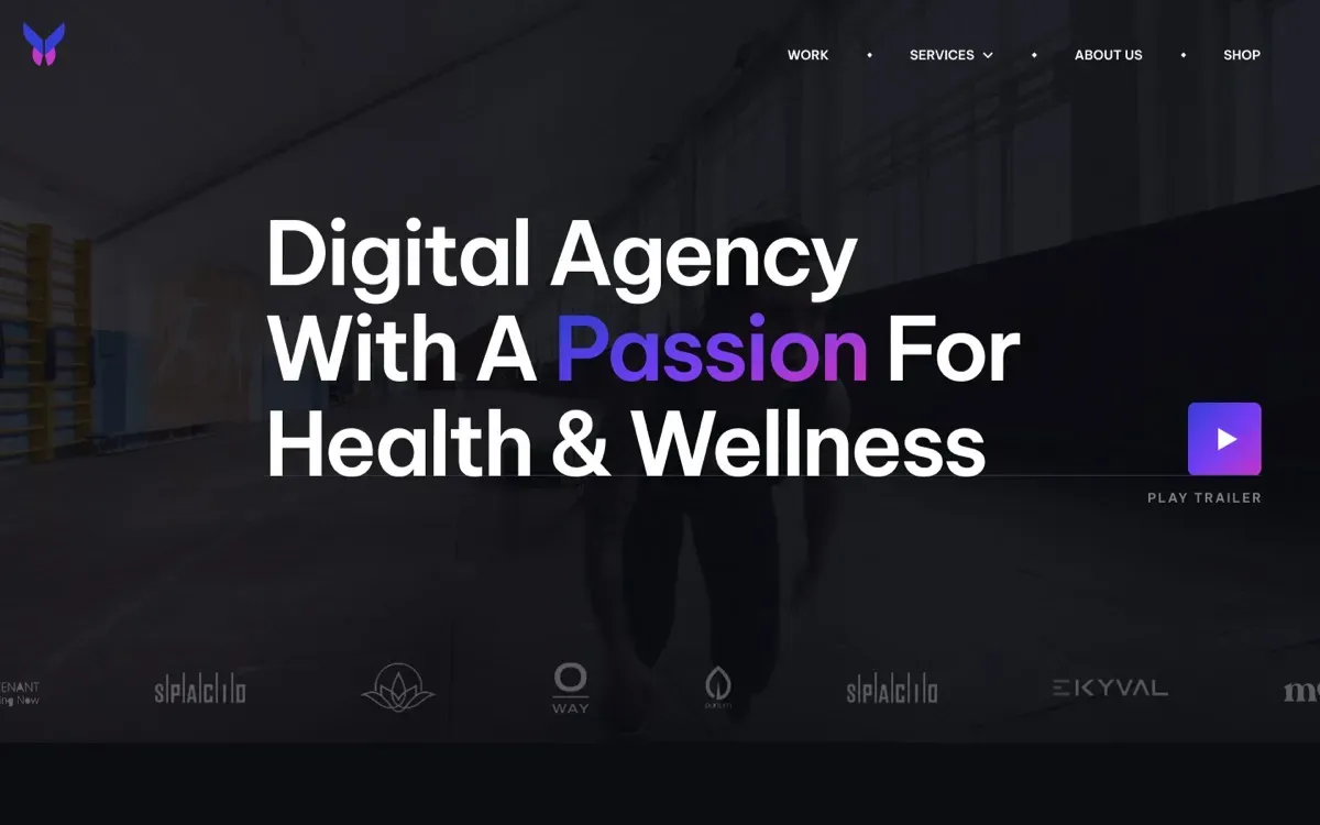 The WonderAds website, built by Ditrapoint, shown on a laptop and a phone